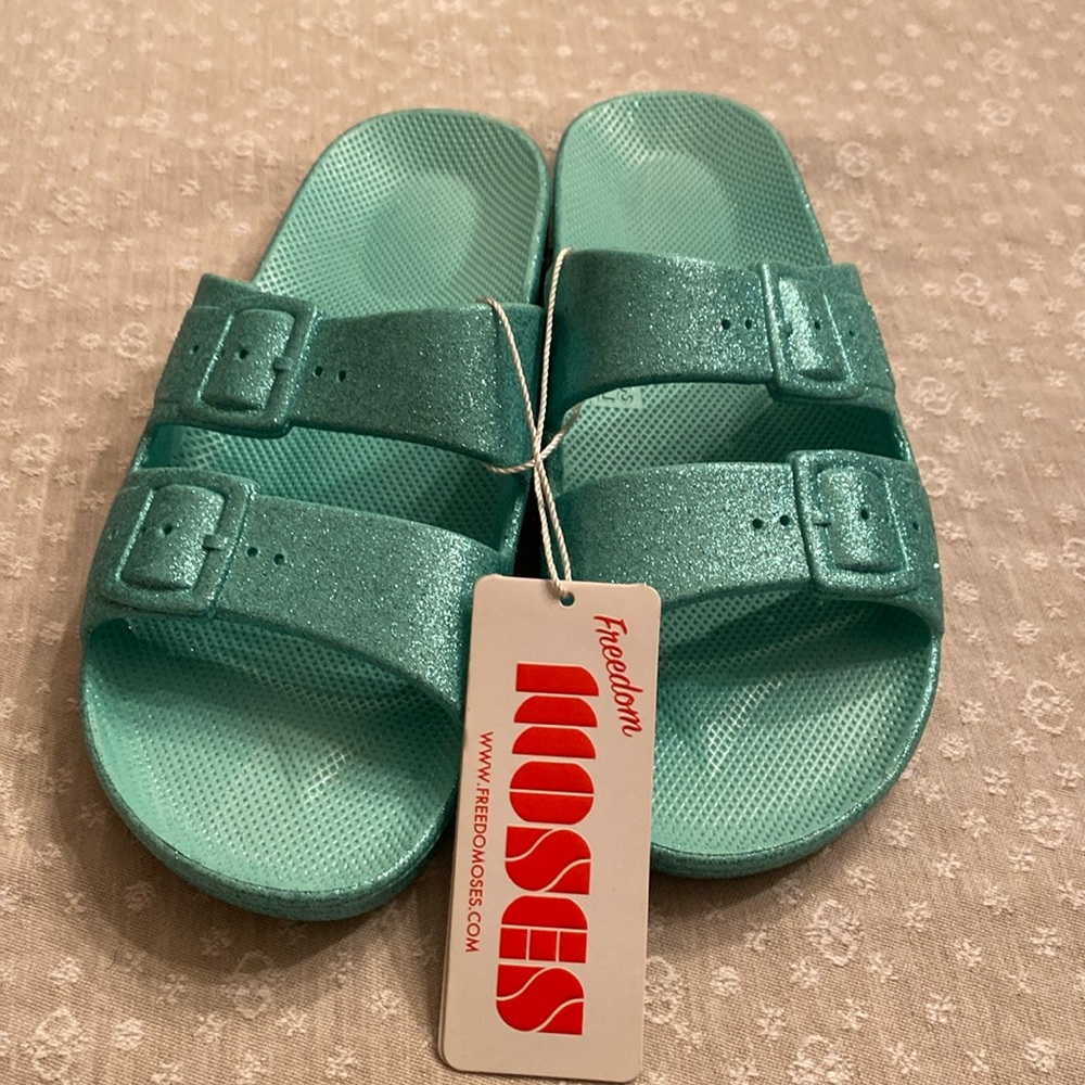 Freedom Moses turquoise sparkle slides